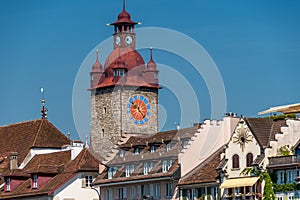 The famous red clock tower in old city, Luzern, Switzerland