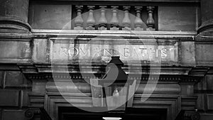 The famous Roman Baths in the historic city of Bath England in black and white