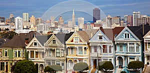 Famous row houses in San Francisco with skyline photo