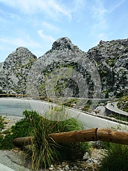 Famous Sa Calobra Road in Maloorca, Spain. Beautiful weather for a bike trip. Vertical Photo.