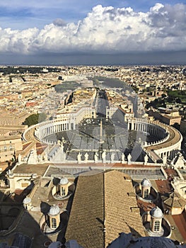 Famous Saint Peter`s Square in Vatican and aerial view of the city, Rome, Italy