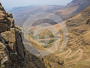 The famous Sani mountain pass dirt road with many tight curves connecting Lesotho and South Africa