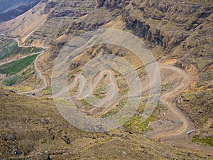 The famous Sani mountain pass dirt road with many tight curves connecting Lesotho and South Africa photo