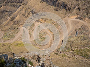 The famous Sani mountain pass dirt road with many tight curves connecting Lesotho and South Africa