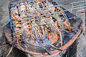 Famous seafood and People around the world well known : shrimp grilled bbq seafood on stove, Grilled River Prawns on the flaming.