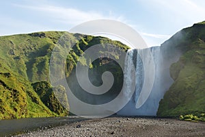 Famous Skogafoss waterfall in summer, South Iceland