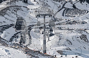 The famous snowed mountain of Parnassos with popular ski resort covered up in snow and unique nature, cable cabins, car