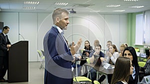 Famous speaker holds business training in the classroom.