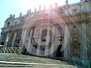 St. Peter square and church in Vatican city in a sunny day. Rome, Italy.