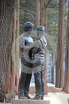 Famous Statue of Bae Yong-Joon and Choi Ji-Woo from Korean Television Drama Series Winter Sonata on Nami Island, South Korea