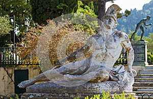 Famous statue Wounded Achilles in the garden of Achillion palace in Corfu