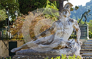 Famous statue Wounded Achilles in the garden of Achillion palace in Corfu photo