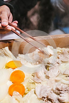 Famous steam chicken in wood box at Noboribetsu Date Jidaimura,