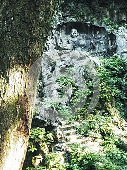 The Famous Stone Sculptures of `Big Belly` Maitreya Buddha and Eighteen Lohan Monks