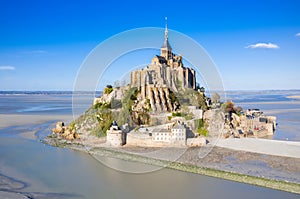 Aerial The famous of top view with blue sky at Mont-Saint-Michel, Normandy, France