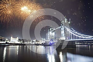 Famous Tower Bridge in the evening with fireworks, London, England