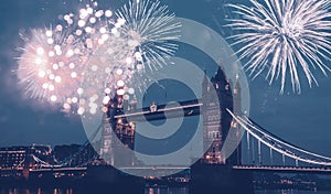 Famous Tower Bridge in the evening with fireworks, London, England