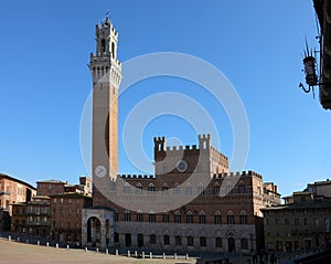 tower of the city of Siena called DEL MANGIA seen from the piazza del Campo photo