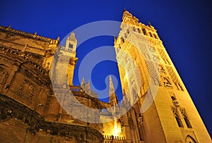 Giralda tower at night, Cathedral of Seville, Andalusia, Spain photo