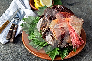 Famous traditional dish of the south of Chile and the Chiloe archipelago - Curanto al Hoyo, Kuranto. Different seafood