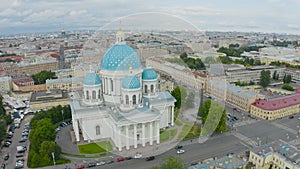 The famous Trinity Cathedral with blue domes and gilded stars, view of the historic part of the city of Staint-Petersburg, typical