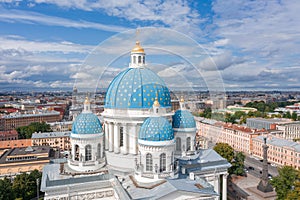 The famous Trinity Cathedral with blue domes and gilded stars, view of the historic part of the city of Staint-Petersburg, typical