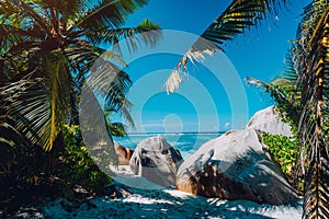 Famous tropical beach Anse Source d`Argent natural palm shade, granite boulders, La Digue Island, Seychelles