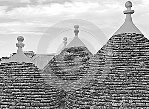 The famous Trulli roofs in Alberobello, Puglia Italy in black and white 