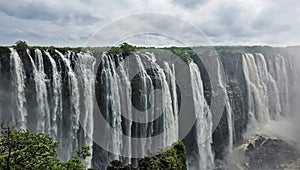 The famous Victoria Falls. Powerful streams of water fall into a gorge