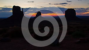 Famous view of Monument Valley before sunrise with the Mittens and Merrick butte