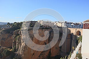 Famous view on the Puente Nuevo crossing the El Tajo Canyon in Ronda, cozy historical city in Andalusia, Spain