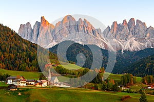 Famous village of Santa Maddalena at autumn colors in the background of the Odle mountain range, Funes valley Trentino Alto Adige