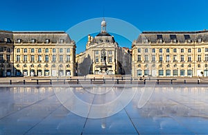 Famous water mirror fountain in front of Place de la Bourse in Bordeaux, France