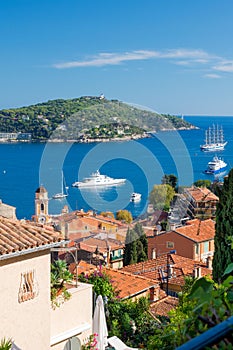 The famous Wellcome Hotel on the Cote d`Azur. Promenade Villefranche-sur-Mer, a resort on the French Riviera. photo