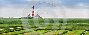 Famous Westerheversand lighthouse at North Sea, Schleswig-Holstein, Germany