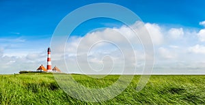 Famous Westerheversand lighthouse at North Sea, Schleswig-Holstein, Germany