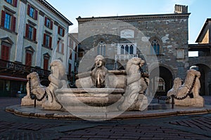 Famous white marble Contarini Fountain in the middle of Piazza Vecchia square in Bergamo Upper Town