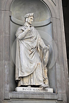 Famous white marble monument of Dante Alighieri by Enrico Pazzi in Piazza Santa Croce, next to Basilica of Santa Croce, Florence, photo