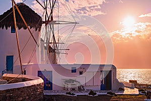 Famous windmills on the island of Mykonos at sunset.