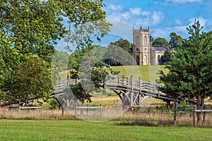 The Chinese Bridge and St. Mary Magdalene Church in Croome Park, Worcestershire, England.