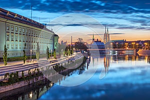Famous Wroclaw landmarks in panoramic view of the city, Oder river, illuminated historic buildings and bridges