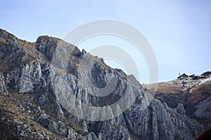 Famouse limestone cliff detail in Rimetea, Romania photo