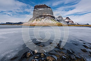 Famouus beautiful mountain in Iceland surrounded by ice