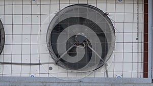 The fan of the industrial air conditioner rotates