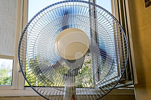 Fan near an open window