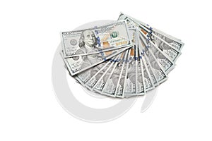 Fan of new hundred dollar bills isolated on white background top view