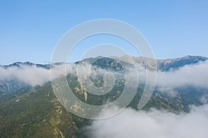 The Fan Si Pan massif and its green mountains, in Asia, in Vietnam, in Tonkin, towards Sapa, in summer, on a sunny day