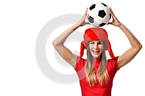 Fan sport woman player in red uniform and russian winter hat hold soccer ball celebrating