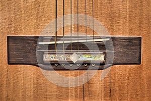 Fancy and aged acoustic guitar bridge and top - belonging to Arlo Guthrie at Woodstock