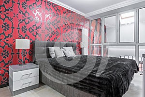 Fancy bedroom with ornament wallpaper